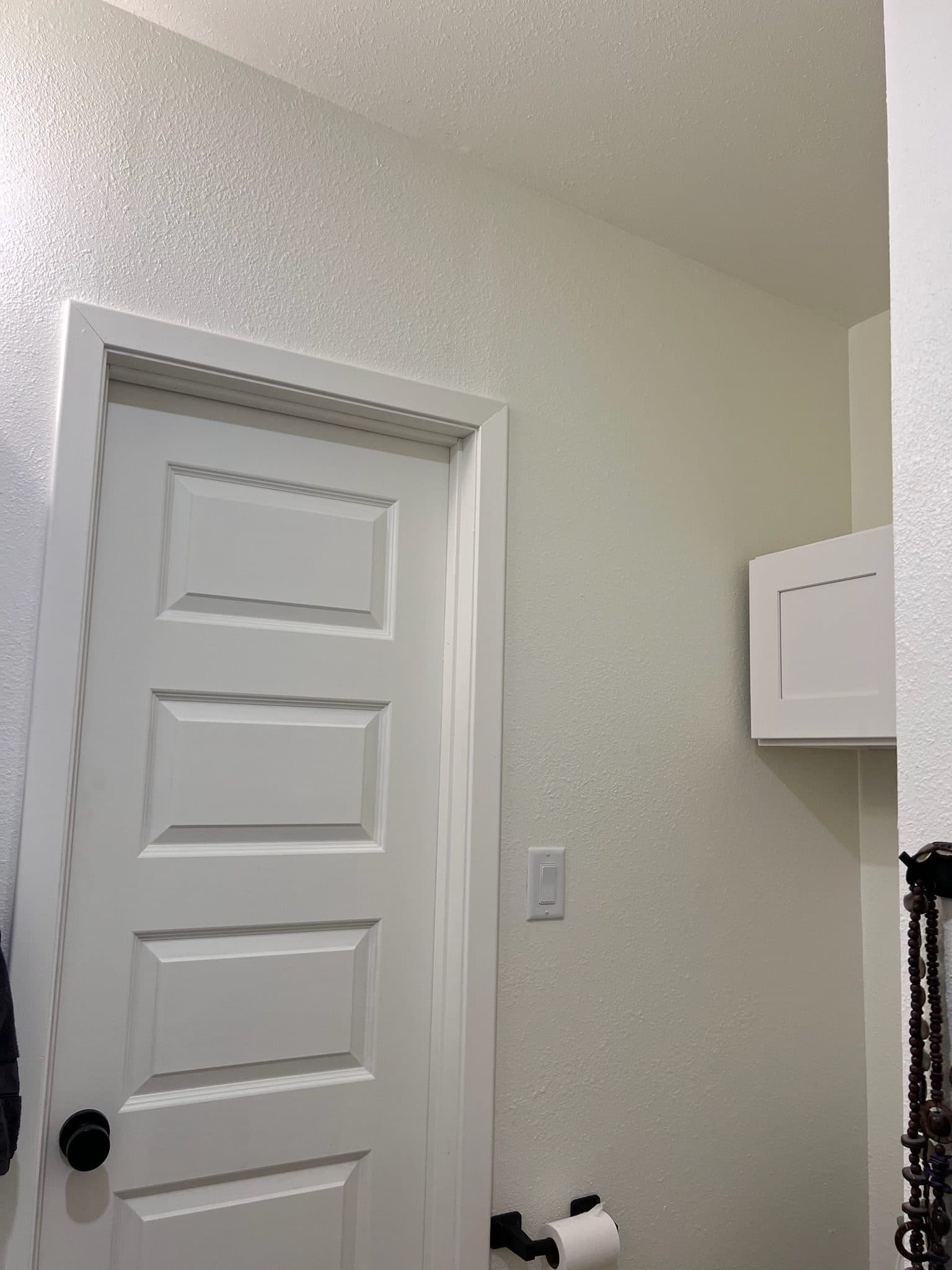 White 5-panel interior door with satin nickel hardware